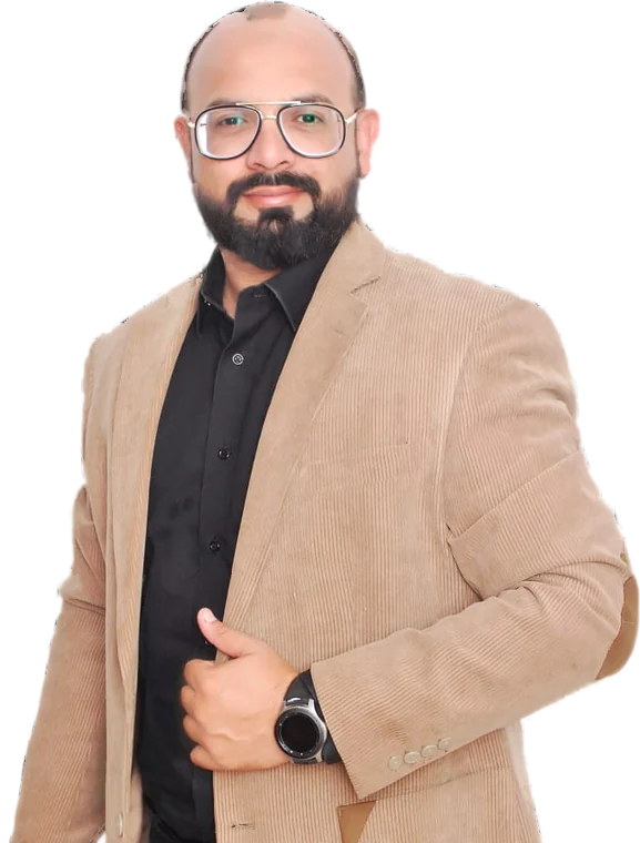 Sir Xahid Anwar in a camel corduroy blazer